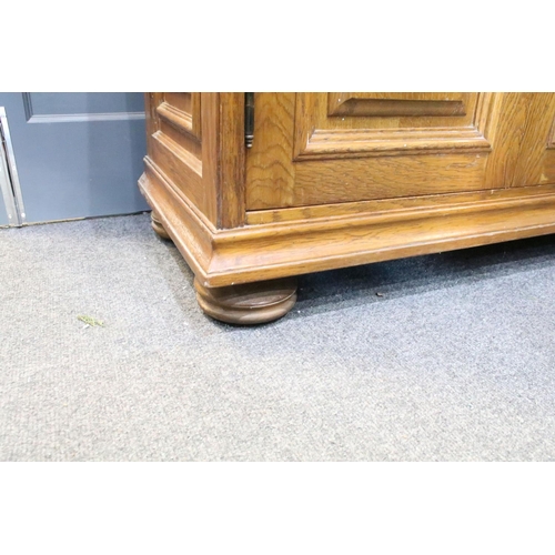 571 - German Oak Dresser Base or Side Cabinet with two drawers over two cupboard doors, raised on bun feet... 