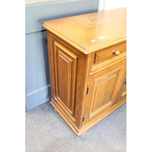 571 - German Oak Dresser Base or Side Cabinet with two drawers over two cupboard doors, raised on bun feet... 