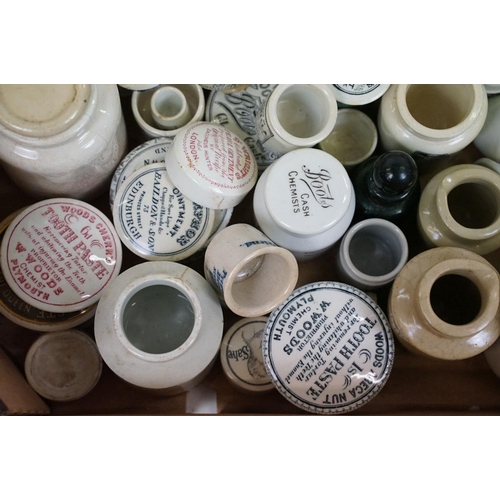 118 - Collection of Victorian and early 20th Century pharmacy / apothecary pot lids and bottles. The lot t... 