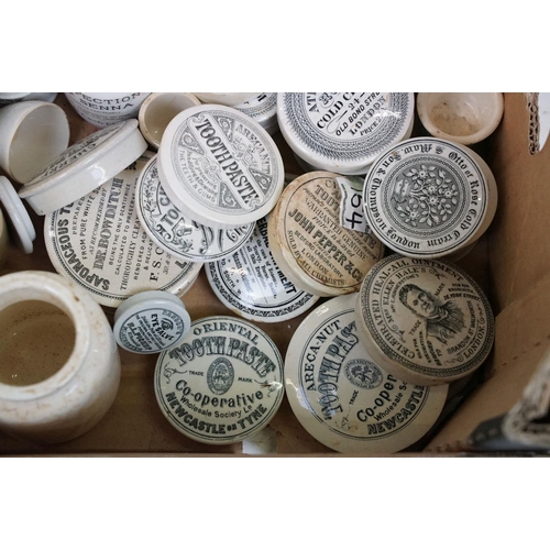 118 - Collection of Victorian and early 20th Century pharmacy / apothecary pot lids and bottles. The lot t... 