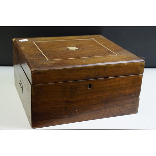 169 - Early 20th Century mahogany cased table top Kalliope music box playing 23cm discs, the lid interior ... 