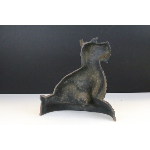 382A - Cast iron doorstop modelled as a Scottish Terrier dog, measures approx 29cm tall