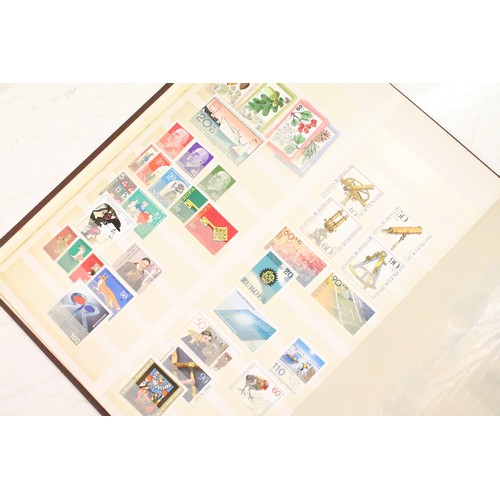 417 - Large collection of stamps to include approximately 65 presentation packs (mostly early 21st Century... 