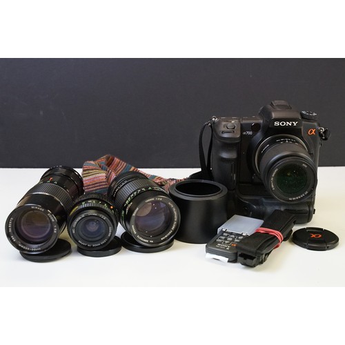 392 - A Sony A700 digital camera with lens and accessories together with a selection of Jewellery making e... 