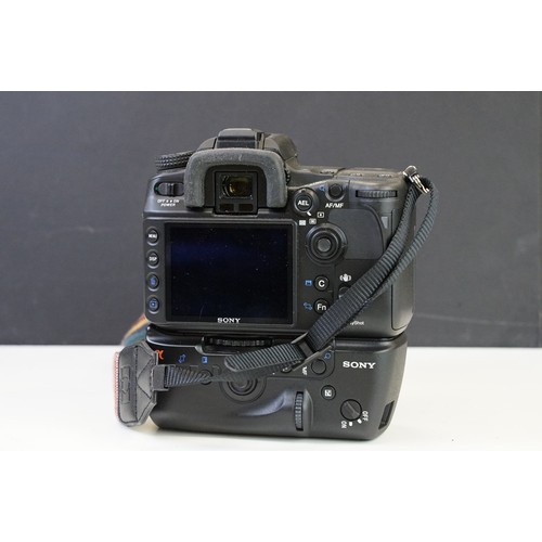 392 - A Sony A700 digital camera with lens and accessories together with a selection of Jewellery making e... 