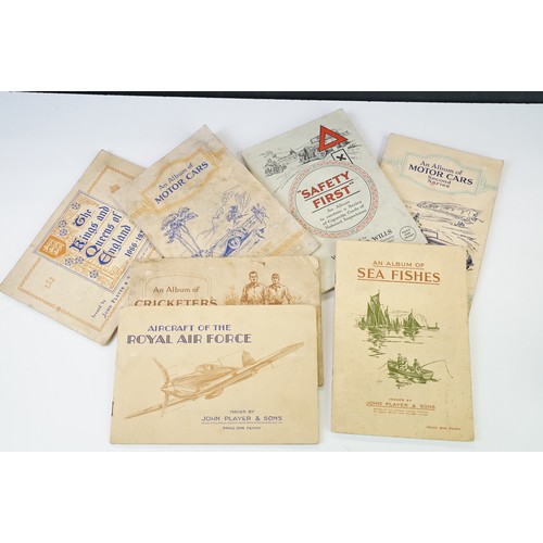 415A - Collection of postcards & cigarette cards, the cigarette cards contained within various albums (to i... 