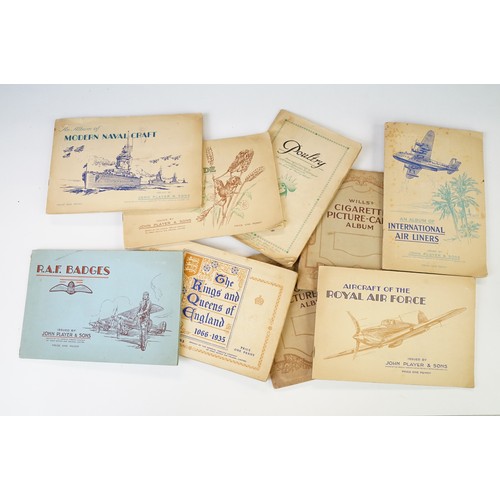 415A - Collection of postcards & cigarette cards, the cigarette cards contained within various albums (to i... 