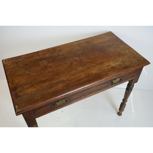 629 - Late 19th / Early 20th century Side Table with single long drawer raised on turned legs, 92cm long x... 