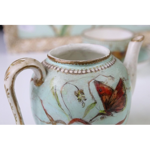 56 - Royal Worcester porcelain cabaret tea set with hand painted butterfly, floral and foliate decoration... 