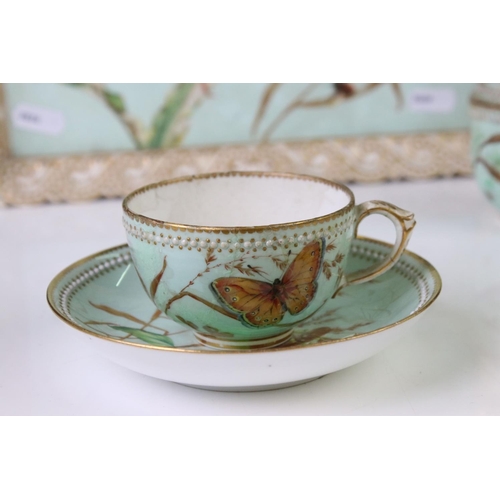 56 - Royal Worcester porcelain cabaret tea set with hand painted butterfly, floral and foliate decoration... 