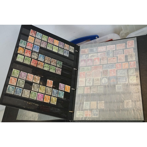 401 - A large collection of British, World & commonwealth stamps contained within eighteen albums together... 