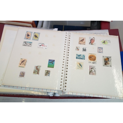 401 - A large collection of British, World & commonwealth stamps contained within eighteen albums together... 