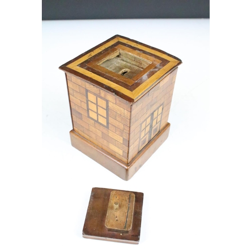 132 - Chinese wooden puzzle money box modelled as a house, character marks to base, approx 12cm high