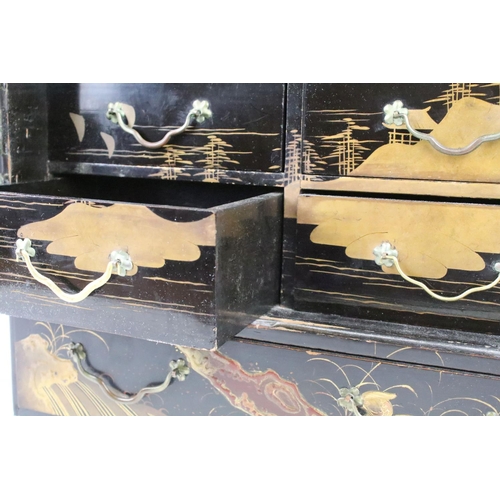 133 - Chinese black lacquered table top cabinet, with painted & gilt decoration of birds & tress, with sil... 