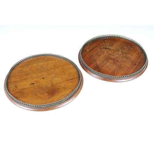 147 - Pair of 19th  / Early 20th century Mahogany Circular Trays or Stands with pierced brass galleries, 2... 