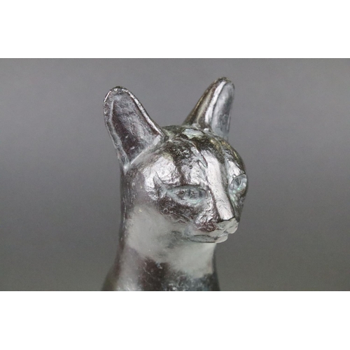 148 - Austin Prod - A 1960's bronzed resin sculpture of a seated cat, impressed 'Austin Prod Inc 1965', ra... 