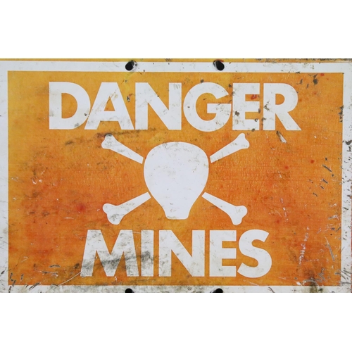 153 - ' Danger Mines ' rectangular metal warning sign, with white lettering on an orange ground, approx 29... 