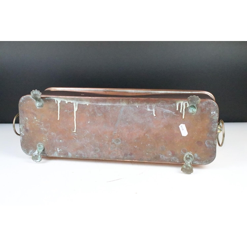 164 - Large Copper Planter of rectangular form with rounded corners and rolled edge, having a pair of lion... 