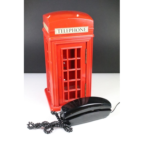 167 - Painted wooden model telephone box housing a Dialatron Designer Telephone 2000. (Telephone box appro... 