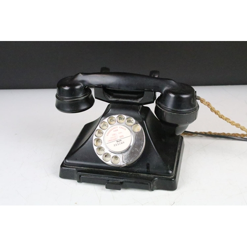 168 - Early-to-mid 20th C black Bakelite dial telephone