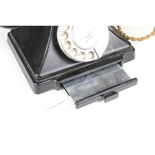 168 - Early-to-mid 20th C black Bakelite dial telephone