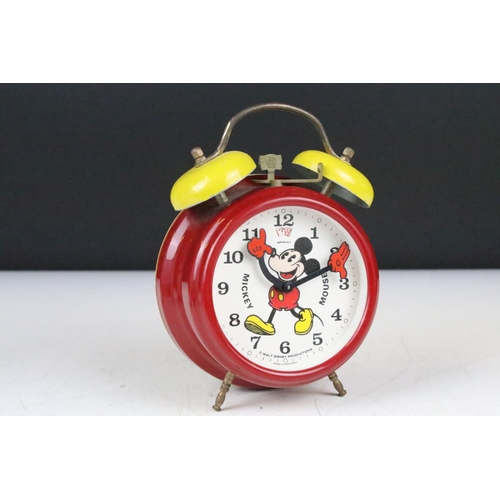 173 - Two vintage Walt Disney novelty wind up alarm clocks to include Mickey Mouse and Donald Duck