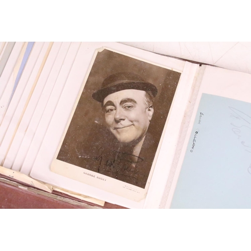 186 - An early to mid 20th century autograph album containing a good selection of celebrity autographs to ... 