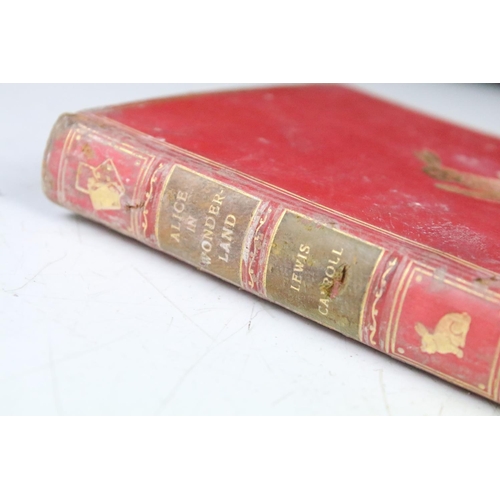 187 - A hardbound 1869 edition of Alice's Adventures in Wonderland with forty two illustrations by John Te... 