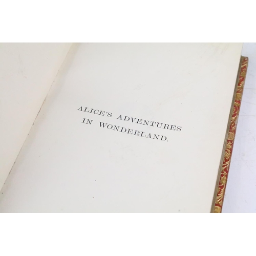 187 - A hardbound 1869 edition of Alice's Adventures in Wonderland with forty two illustrations by John Te... 