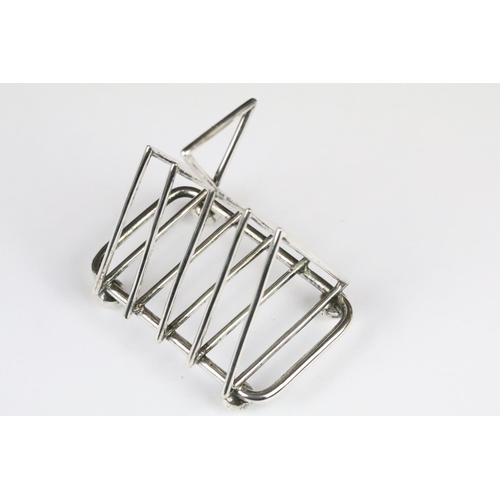 194 - Late 19th / Early 20th century Silver Plate Four Section Toast Rack in the manner of Christopher Dre... 