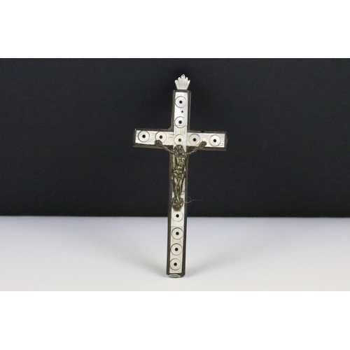 198 - An early 20th century crucifix with mother of pearl decoration, approx 13cm in height.