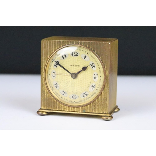 204 - An early 20th century swiss made Zenith travel clock complete with travel case.