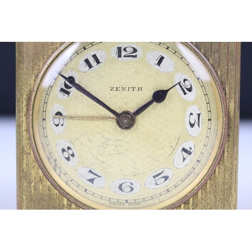 204 - An early 20th century swiss made Zenith travel clock complete with travel case.