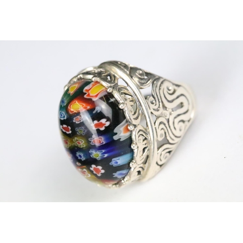 215 - Silver and glass millefiori dress ring. Marked 925.