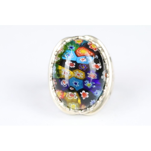 215 - Silver and glass millefiori dress ring. Marked 925.