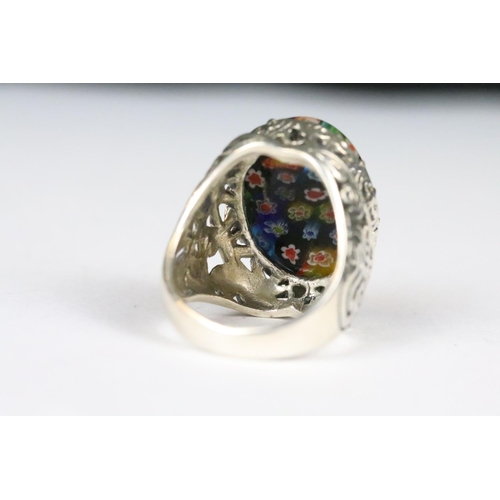 215 - Silver and glass millefiori dress ring. Marked 925.