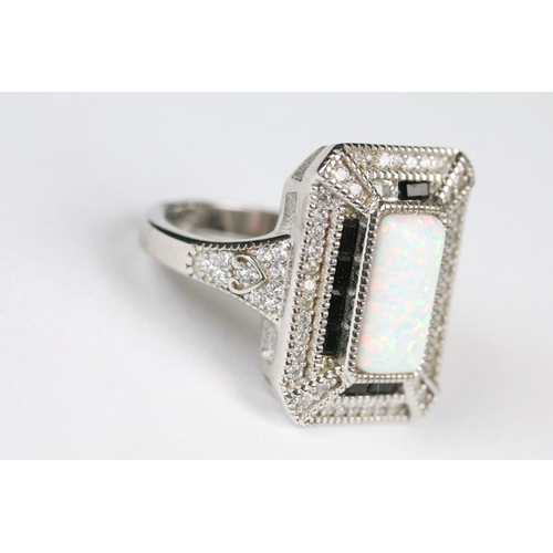 240 - Silver CZ and Opal pannelled Ring, cased