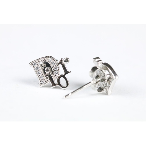 249 - Pair of Silver and CZ designer style Stud Earrings, cased