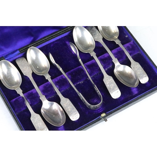 263 - A cased set of six fully hallmarked sterling silver teaspoons with sugar tongs, assay marked for She... 