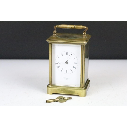 A Victorian brass repeating carriage clock, Thomson & Profaze