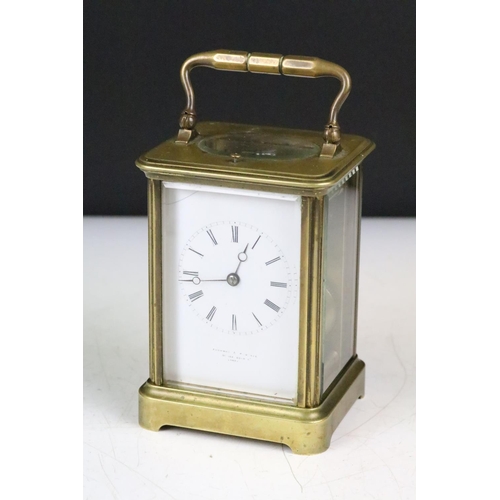 A Victorian brass repeating carriage clock, Thomson & Profaze