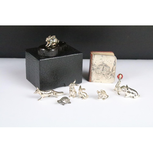 274 - A collection of sterling silver and white metal miniature animal figures together with a hallmarked ... 