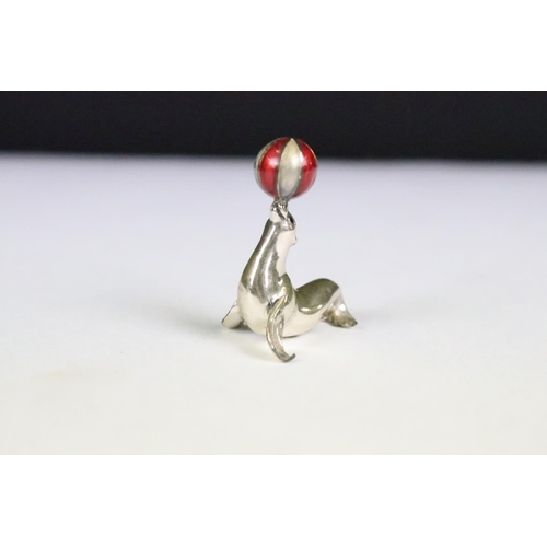 274 - A collection of sterling silver and white metal miniature animal figures together with a hallmarked ... 