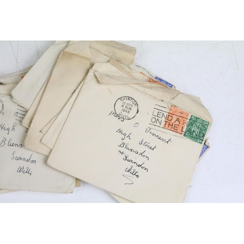 418 - A box of mixed collectables to include 1940's posted letters, marbles, postcards, autograph album an... 