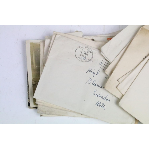 418 - A box of mixed collectables to include 1940's posted letters, marbles, postcards, autograph album an... 