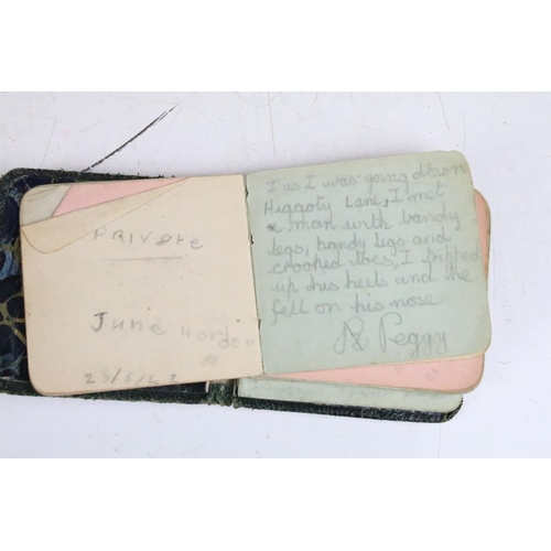 418 - A box of mixed collectables to include 1940's posted letters, marbles, postcards, autograph album an... 