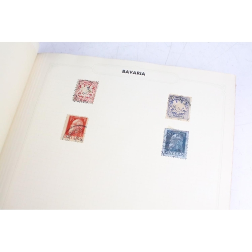 419 - A collection of British, Commonwealth and world stamps contained within a red simplex album to inclu... 