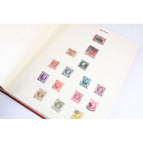 419 - A collection of British, Commonwealth and world stamps contained within a red simplex album to inclu... 