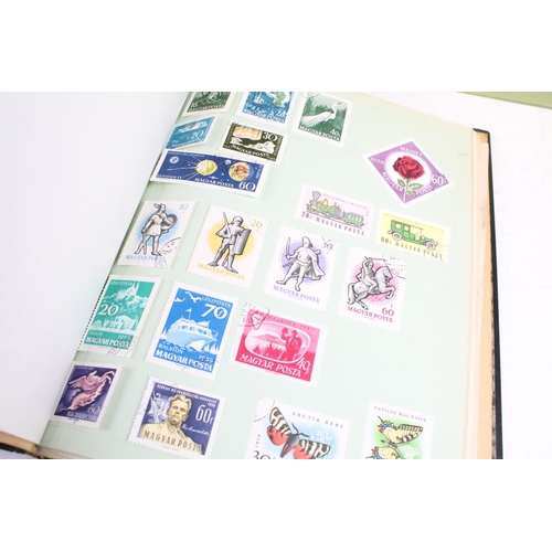 421 - A collection of British, Commonwealth and world stamps contained within albums together with a quant... 