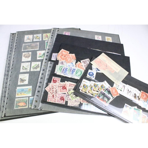 421 - A collection of British, Commonwealth and world stamps contained within albums together with a quant... 